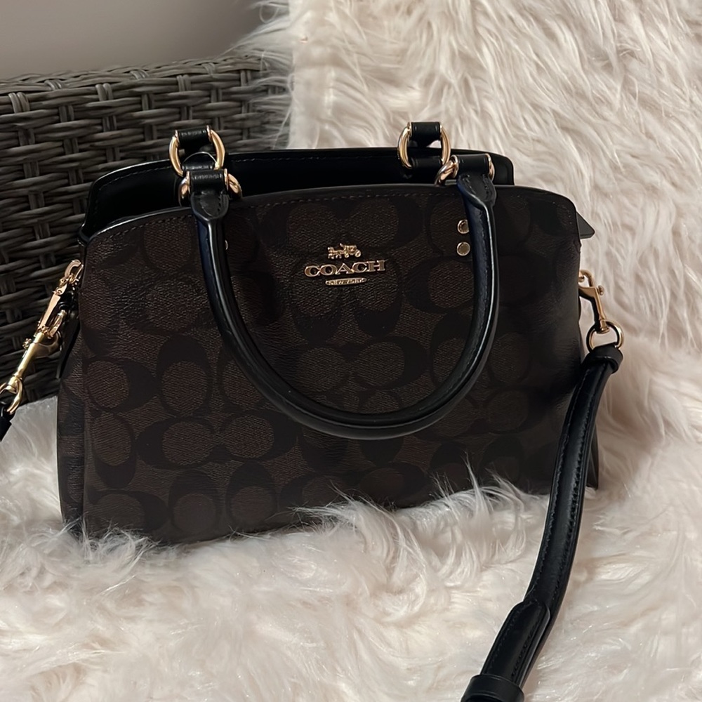 Coach mini carry all brand new